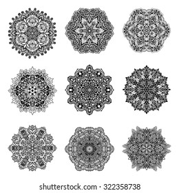 Decorative black and white mandala symbols set isolated vector illustration