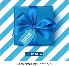 Decorative Blue Gift Box With Blue Bow And Sale Tag. Winter Holiday Or Father's Day Decoration. Vector Illustration. New Year Sale Template