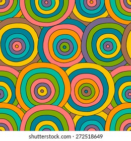 Decorative bright geometric pattern with doodle  circles. Seamless pattern can be used for wallpaper, web page background, surface textures, kids design. Hand-drawn vector illustration.