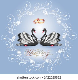 Decorative card with two black swans and round vintage luxurious ornament and golden rings for invitations or congratulations with wedding or engagement with caligraphic inscription
