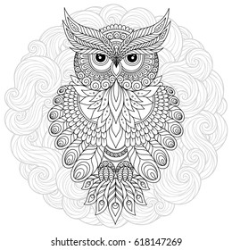 Decorative cartoon owl in zentangle style. Page for adult coloring book.Hand drawn vector illustration isolated on white.