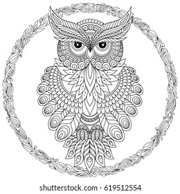 Decorative cartoon owl in zentangle style. Page for adult coloring book.Hand drawn vector illustration isolated on white.