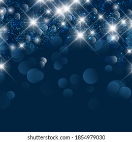 Decorative Christmas background with bokeh lights and stars