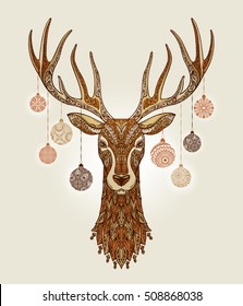 Decorative christmas deer with ornament and decoration balls on antlers