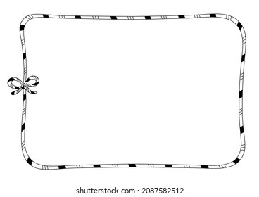 Decorative Christmas frame with candy cane stripes and a bow.
