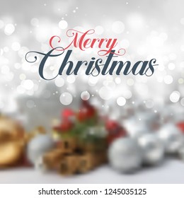 Texto de navidad decorativa sobre un fondo desenfocado 