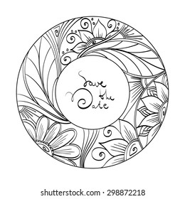 Decorative circular frame with graphic ornamental pattern. Black contour frame isolated on white background. Hand drawn flowers and leaves.