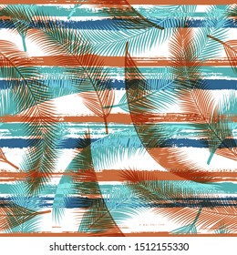 Decorative coconut palm leaves tree branches over painted stripes seamless pattern design. Indonesian forest foliage beach fashion fabric print. Tropical leaves silhouettes wallpaper.