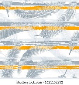 Decorative coconut palm leaves tree branches over painted stripes seamless pattern design. South african jungle foliage swimwear textile print. Tropical leaves silhouettes wallpaper.