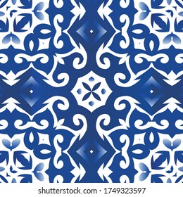 Decorative color ceramic azulejo tiles. Geometric design. Vector seamless pattern theme. Blue folk ethnic ornament for print, web background, surface texture, towels, pillows, wallpaper.