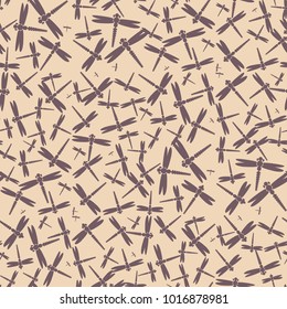 Decorative colored seamless pattern with cute dragonfly. Vintage background with many dragonflies silhouettes for your design.