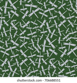 Decorative colored seamless pattern with cute dragonfly. Vintage background with many dragonflies silhouettes for your design.
