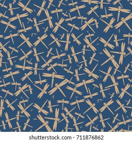 Decorative colored seamless pattern with cute dragonfly. Vintage background with many dragonflies silhouettes for your design.