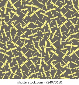 Decorative colored seamless pattern with cute dragonfly. Vintage background with many dragonflies silhouettes for your design.