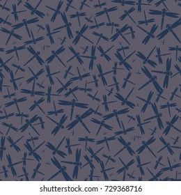 Decorative colored seamless pattern with cute dragonfly. Vintage background with many dragonflies silhouettes for your design.