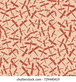 Decorative colored seamless pattern with cute dragonfly. Vintage background with many dragonflies silhouettes for your design.