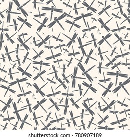Decorative colored seamless pattern with cute dragonfly. Vintage background with many dragonflies silhouettes for your design.