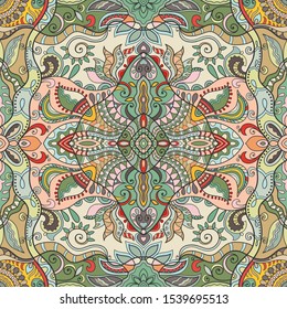 Decorative colorful seamless pattern. Fantasy doodle background with stylized flowers and leaves. Hand drawn ethnic mandala ornament for textile fabric or paper print. Design for scarf, shawl, hijab