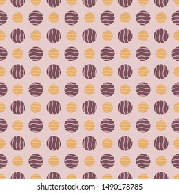 Decorative colorful seamless pattern. Striped circles in wave on pink background.