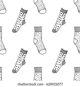 Decorative doodle socks. Black and white seamless pattern for coloring book, pages