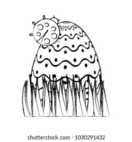 decorative easter egg with ladybug on grass