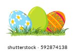 Decorative Easter eggs on green grass, vector illustration