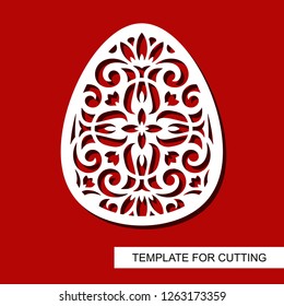 Decorative element - Easter Egg with floral ornament. Template for laser cutting, wood carving, paper cut and printing. Vector illustration.