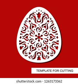 Decorative element - Easter Egg with floral ornament. Template for laser cutting, wood carving, paper cut and printing. Vector illustration.