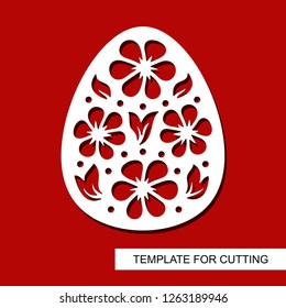 Decorative element - Easter Egg with floral ornament. Template for laser cutting, wood carving, paper cut and printing. Vector illustration.