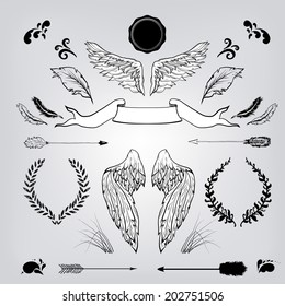 Decorative elements set: wings, arrows, laurel, feathers, ribbons and labels.