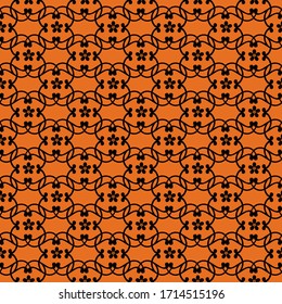 decorative floral openwork pattern on orange background