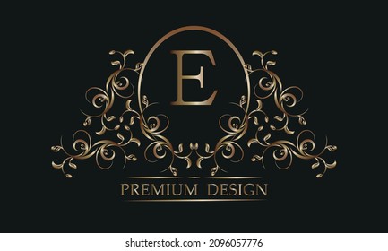 Decorative floral pattern with a letter in the center of E. Bronze elegant frame on a black background. Exclusive monogram, business sign design element, identity for hotel, restaurant, jewelry, fashi
