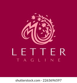 Decorative flower leaf M letter logo design.