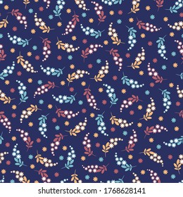 Decorative flowers on deep blue background seamless pattern