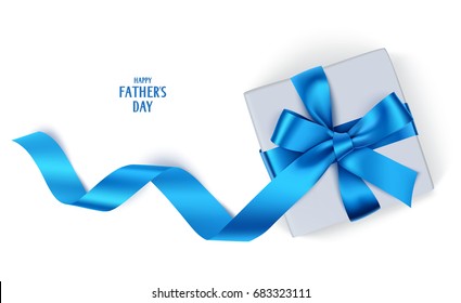 Decorative gift box with blue bow and long ribbon. Happy Father's Day text. Top view. Vector gift box isolated on white