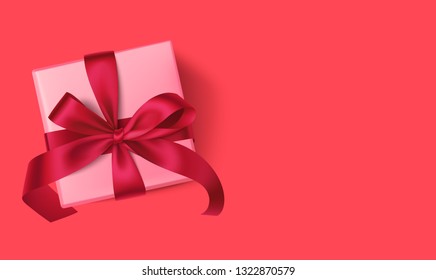 Decorative gift box with red bow isolated on red background. Top view. Holiday design template. Vector illustration