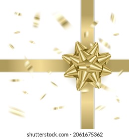 Decorative golden bow on white background. Christmas and New Year holiday decoration