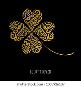 Decorative golden lucky four leaf clovers, design elements. Can be used for cards, invitations, banners, posters, print design. St Patricks day theme