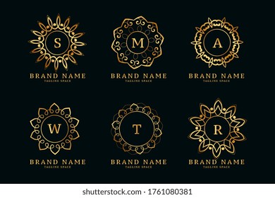 decorative golden mandala style logos with initials set