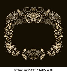 Decorative golden "paisley" frame, paisley wreath on dark background