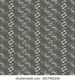 Decorative graphics in black and white, a complicated weave of lines, from which results a pattern with geometric elements arranged in a vertical chain.