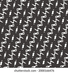 Decorative graphics in black and white, obliquely aligned signs arranged alternately or at some distance, a few flecks and dashes. Textile design.