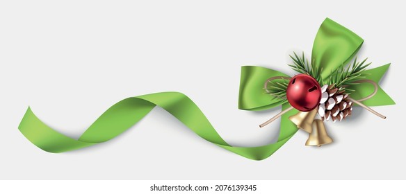 Decorative green bow, bell and pine cones with swirled ribbon and pine branches isolated on white background. Christmas or New Year decoration on the corner for your design template