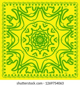 Decorative green color ornament on yellow background. Symmetric pattern with floral mandala. For Bandana, fabric print
