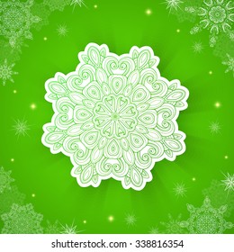 Decorative green vector Christmas background with snowflake