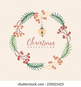 Decorative greeting wreath with Christmas tree toy. Hand drawn illustration. Design elements.