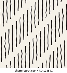 Decorative hand drawn lines seamless pattern. Endless ornament with black ink strokes doodles. Freehand painted stylish background.