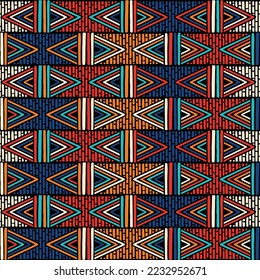 Decorative hand drawn seamless pattern. Abstract colorful floral geometric background, doodle artistic pattern. Tribal ethnic weave kente print ornament. Textile fabric or paper print