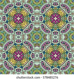 Decorative hand drawn seamless pattern. Colorful abstract art, stylized floral doodle background. Tribal ethnic ornate decoration. Arabic, indian, turkish ornament. Vector geometric repeating texture