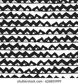 Decorative hand drawn seamless pattern. Endless ornament with black ink doodles on white backdrop. Hand painted stylish background for fabric, wrapping, packaging paper, wallpaper